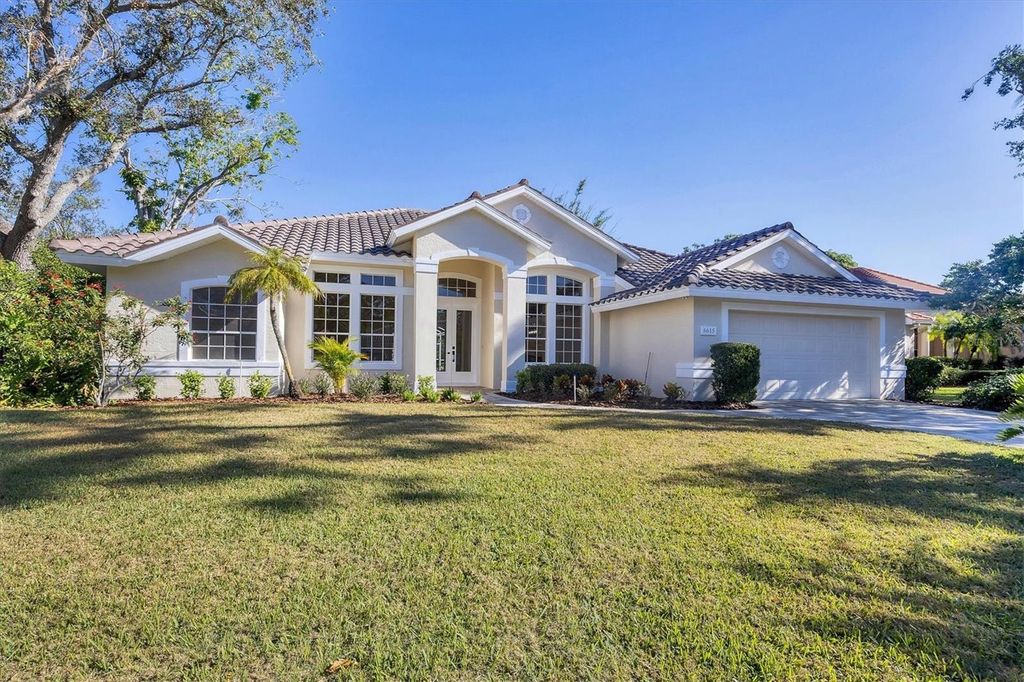 Photo of 6615 Hunter Combe Crossing, University Park, FL 34201 (MLS # A4671401)