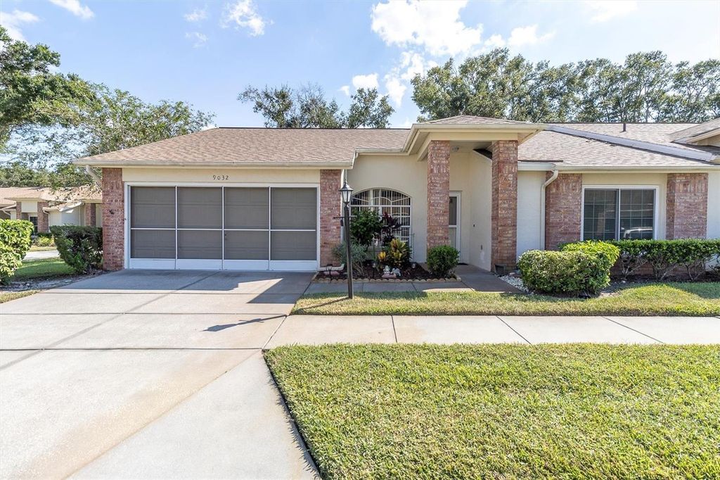 Photo of 9032 Arundle Place, New Port Richey, FL 34655 (MLS # W7879082)