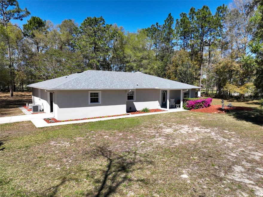 This 2126 sqft, 3 bedroom 2 full bath concrete block house is located on a quiet, dead end street in Keystone Heights. With country living at its finest, this property provides a quality, safe, and peaceful living environment on 1.14 acres. A perfect opportunity for raising a family. This home boasts an open floor plan, hardwood and ceramic tile floors, new AC system, new appliances, and new roof with transferable warranty. This property includes storage shed, enclosed patio, and irrigation system. with no HOA fees, this home is perfect for relaxed and serene living.