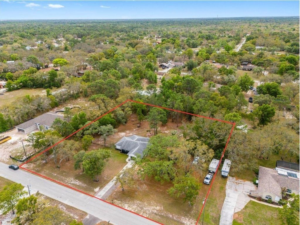 Photo of 16620 Kerry Hills Lane, Spring Hill, FL 34610 (MLS # W7884659)