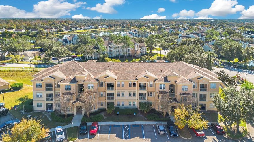 Welcome to 114 Terrace Ridge Circle. Come see this beautiful 2-bedroom, 2-bathroom condo in the highly sought-after Terrace Ridge at Town Center, just minutes from Walt Disney World and other top attractions. This lovely second-floor condo with elevator access features an open-concept layout. The fully equipped kitchen offers a breakfast bar and built-in desk, while both bedrooms are spacious master suites, with one featuring dual sinks, a soaking tub, and a walk-in shower, and the second offering abundant natural light and a generous closet. A full-size laundry room and sliding glass doors open to a private balcony perfect for relaxing. Zoned for short-term rentals or residential use, Terrace Ridge is a well-maintained gated community offering resort-style amenities such as a community pool, jacuzzi, sand volleyball court, and a clubhouse with a fitness center and game room. Monthly HOA dues include cable TV, high-speed internet, trash pickup, water, and sewer. Located just minutes from shopping, dining, golfing, Disney, and with easy access to I-4 and the airport, this property is very easy to show. Reach out to us for your private tour.