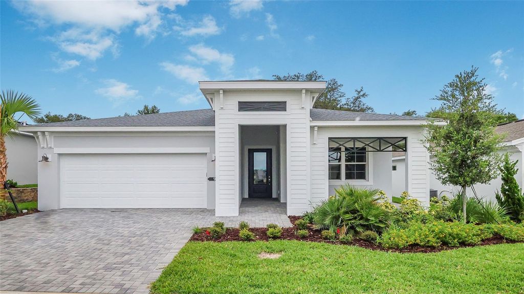 Photo of 948 Club Cresswind Drive, Lady Lake, FL 32159 (MLS # W7885907)