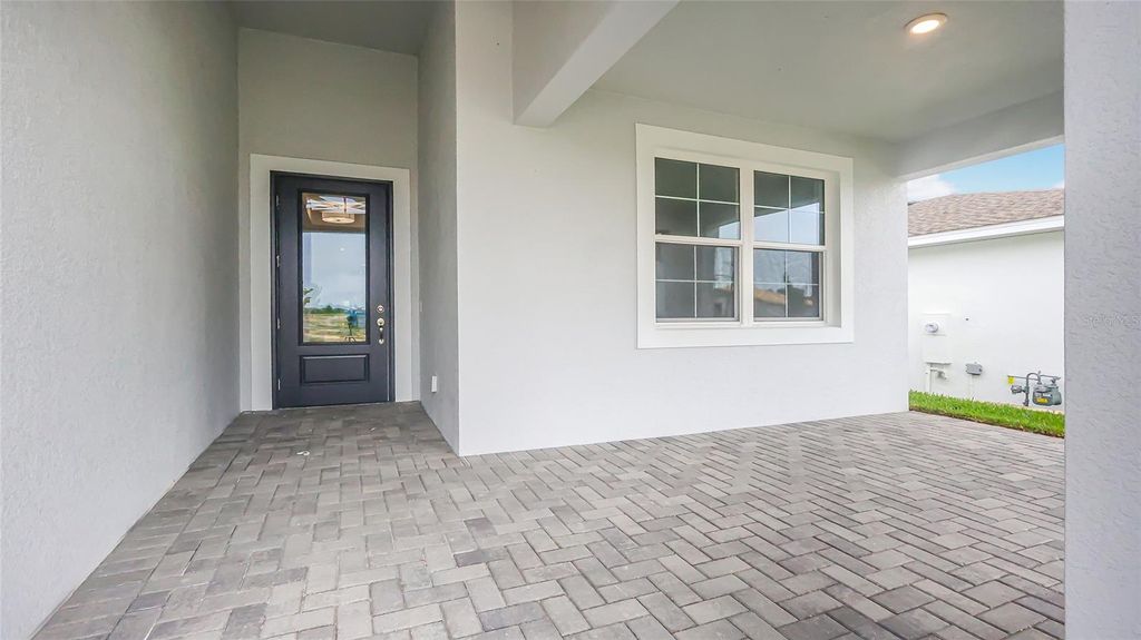 Photo of 948 Club Cresswind Drive, Lady Lake, FL 32159 (MLS # W7885907)