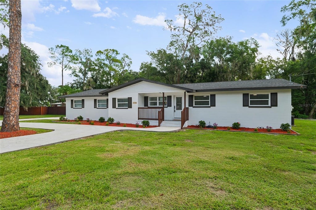 Photo of 1725 Walker Road, Lakeland, FL 33810 (MLS # TB8549624)