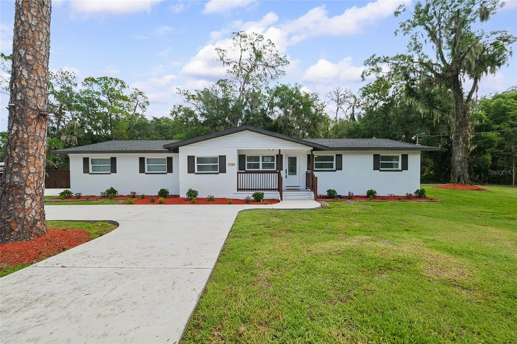 Photo of 1725 Walker Road, Lakeland, FL 33810 (MLS # TB8549624)