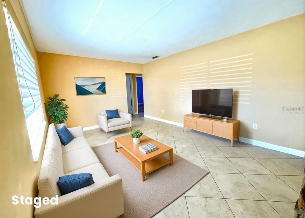 Photo of 6067 43rd Terrace N, Kenneth City, FL 33709 (MLS # TB8472388)