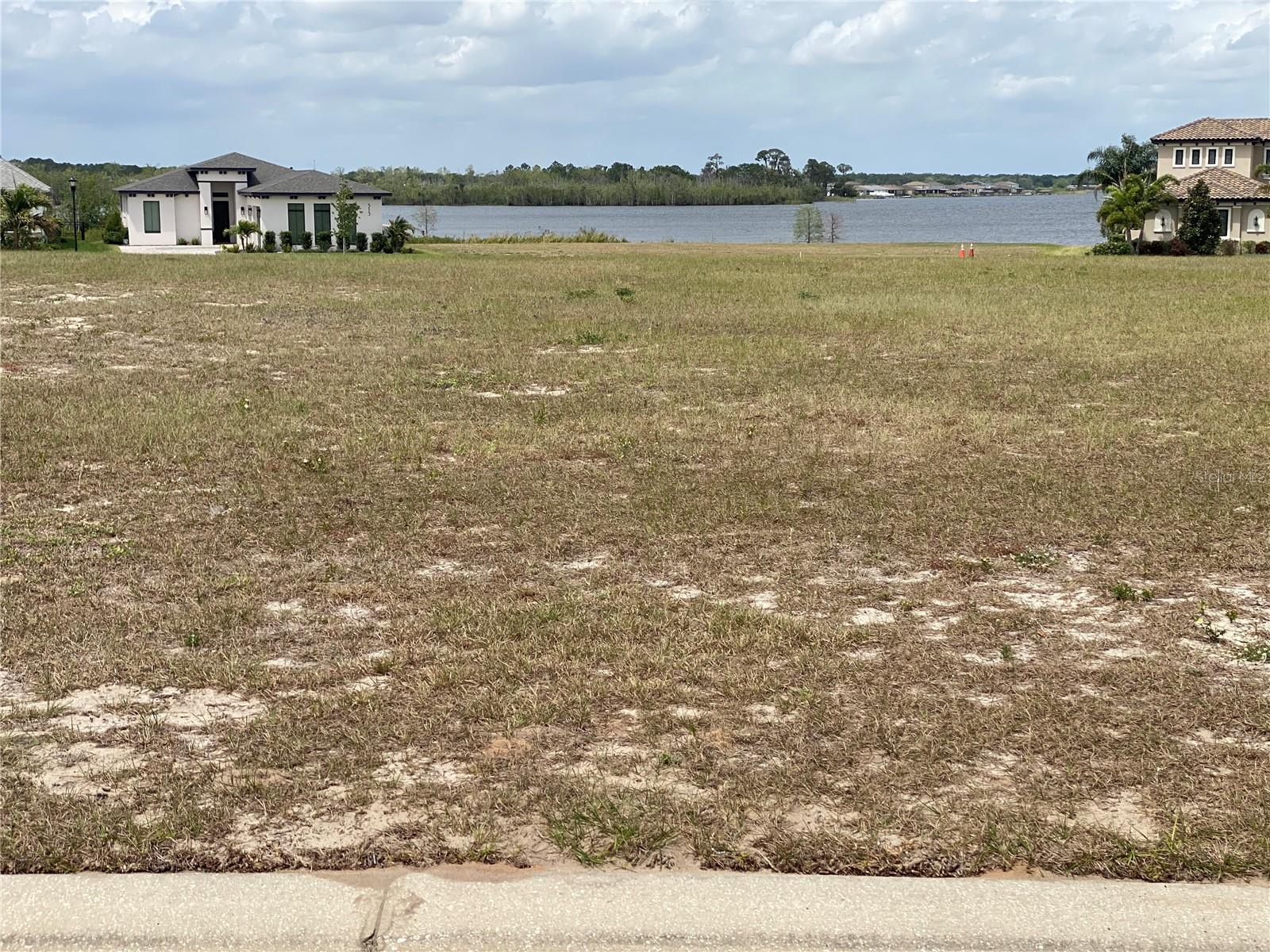 LOCATION, LOCATION, LOCATION!!! The time is now for you to design and build your own house and live the lifestyle you deserve. This Beautiful, Spacious and elevated lot in upscale lakefront gated community Water Ridge.
The amenity package is more than impressive - a clubhouse, including a spa, fitness center and aquatic center - plus tennis courts, walking trails, sidewalks, streetlights, private boat storage and much more! Amenities at Water Ridge include Gated Entryways, Clubhouse, Spa and Fitness Center, Aquatic Center, Two Tennis Courts, Sidewalks, Curb and Gutter Streets, Fountains, Boat Storage Area, Streets Water Ridge residents also have access to three pristine lakes offering boating, fishing, water-skiing, and all your favorite watersport activities.
It is conveniently located between Tampa and Orlando off the I-4. Close to Universal Studios, Disney Parks, Shopping, Restaurants and much more