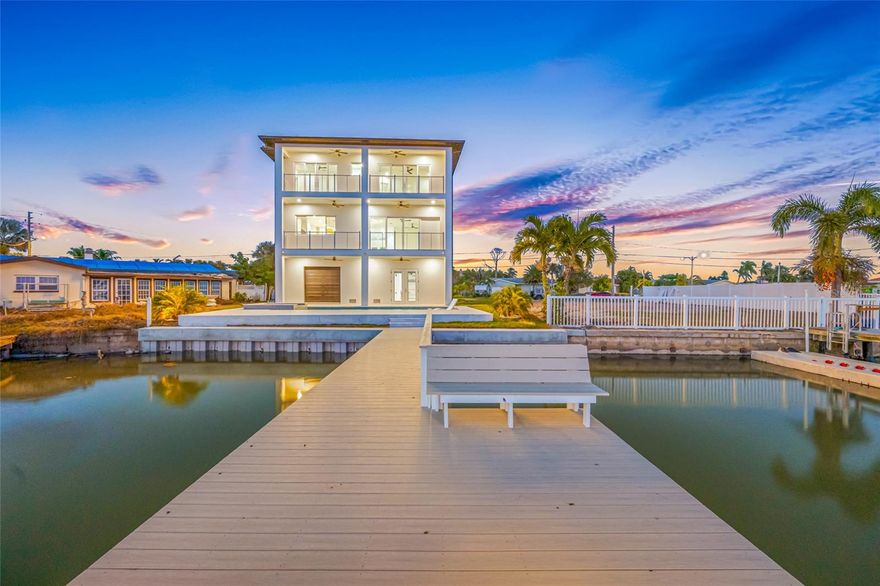 BOATERS PARADISE- DEEP WATER!....Brand New Waterfront Masterpiece — This brand new construction has just been completed and is priced to sell. Offering exceptional value for discerning buyers who crave space, privacy, and endless entertainment. Nestled along the water, this never-before-lived-in home captures luxury and modern practicality with a spacious six-bedroom, six-bath floor plan designed to accommodate hosting friends and family while ensuring everyone has their own sanctuary. The result is a flowing, open-concept design that invites effortless entertaining and everyday living, with a dedicated media room for cinema-grade nights and a thoughtfully appointed home office to support work-from-home needs.The six bedrooms and six baths provide rare flexibility, from guest suites to in-law arrangements or private spaces for multi-generational living. The primary suite is a retreat in itself, featuring a spa-like ensuite and expansive closet space with tranquil water-facing views. The incredible chef-inspired kitchen showcases premium appliances, a large island, walk-in pantry, and finishes that elevate daily living to a luxurious experience. Throughout the home, modern, high-end finishes, smart-home wiring, and designer touches create an ambience of refined sophistication. Waterfront living is at the heart of this home, with serene water views visible from multiple rooms and the promise of outdoor entertaining that extends beyond the indoors. The exterior presents a clean, modern aesthetic with durable, low-maintenance materials, and ample yard space ready for landscaping enhancements, a saltwater pool with heating and cooling feature complete with a raised jacuzzi and additional outdoor lounge areas. Location-wise, you’ll enjoy a prime waterfront neighborhood with easy access to boating, close to the Beach and nearby shops and restaurants. The area combines a quiet, prestigious community feel with modern conveniences, including proximity to top-rated schools, dining, and recreation. From a price-to-value perspective, this new build represents exceptional value for a waterfront property of this caliber, with warranties and builder oversight providing peace of mind and ready occupancy upon escrow closing. This home is a true sanctuary built like a fortress, all block construction on a 3-tier foundation to give you peace of mind. Realtors, bring your pickiest buyers, they will not be disappointed!