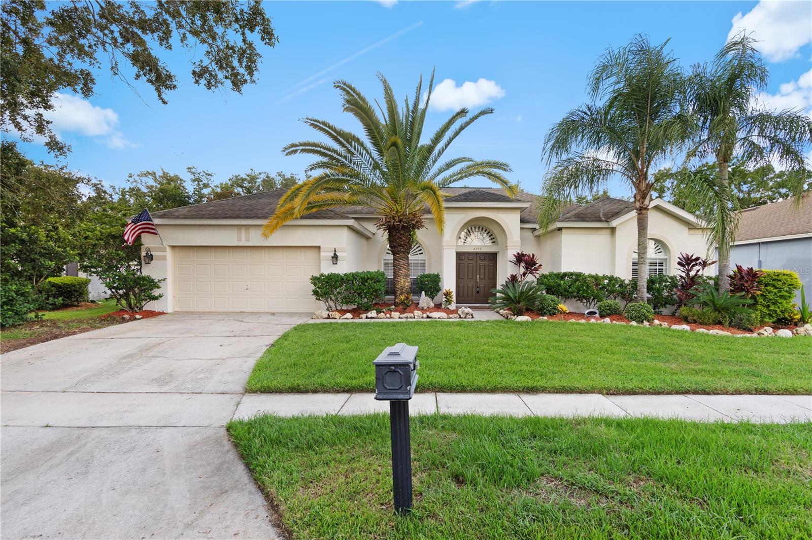 Welcome to 2254 Blackjack Oak St! This stunning 4 bedroom, 3 bath pool home is nestled in the highly desirable gated community of Wesmere. Step inside and you’re greeted by elegant tile flooring throughout the main living areas, a formal living room, and a cozy sitting area complete with an electric fireplace. The heart of the home is the spacious kitchen, showcasing a stylish backsplash, center island with cooktop, built-in microwave and oven combo, ample cabinet and counter space, closet pantry, and a bright eat-in nook. The kitchen seamlessly flows into the family room, where custom built-in shelving with storage creates both function and charm. Sliding glass doors open to the screened, covered lanai and sparkling pool, perfect for entertaining or simply relaxing in your private backyard oasis, with mature landscaping and no rear neighbors. The primary suite is a true retreat, highlighted by a graceful archway leading into a spa like bath with extended vanity, dual sinks, soaking tub, glass enclosed shower, linen closet, and private sliding door access to the backyard. An additional bathroom offers convenient pool access, while the remaining bedrooms share a well-appointed hall bath. Living in Wesmere means more than just a beautiful home you’ll enjoy tree lined streets and resort style amenities, including a community pool, tennis courts, playground, and scenic walking and biking paths. Plus, with quick access to the 408, 429, and Florida’s Turnpike, commutes to Disney, downtown Orlando, and beyond are effortless. Don’t miss the opportunity to call this exceptional property home!