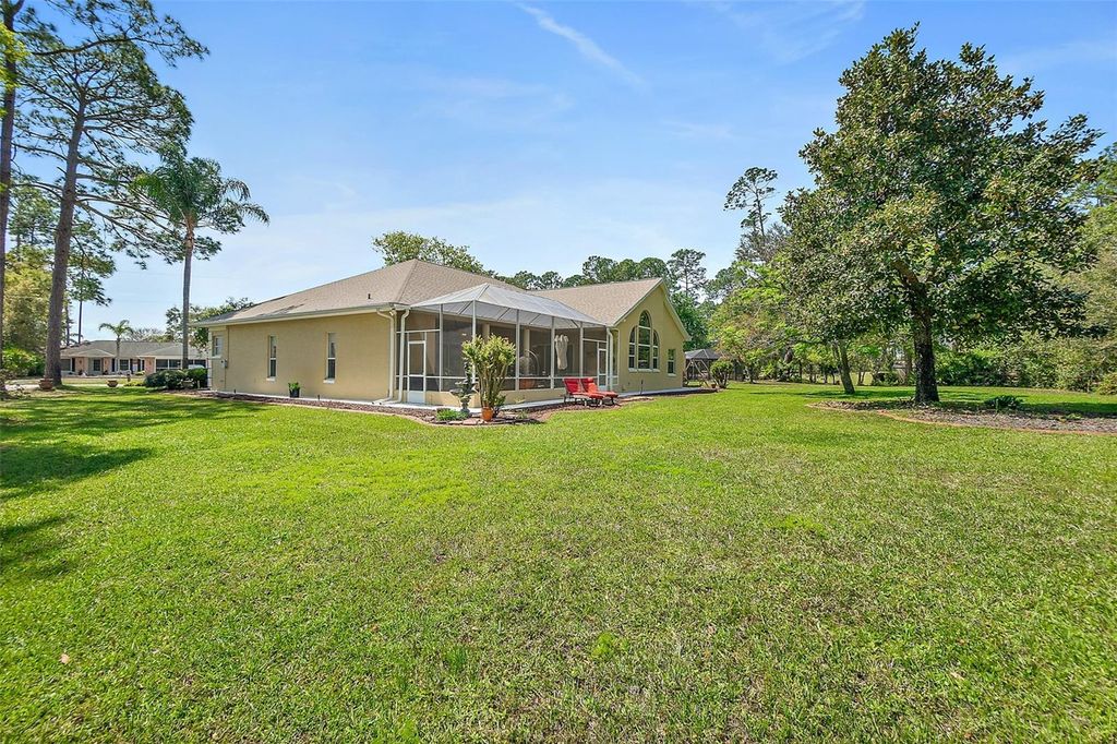Photo of 56 Egret Trail, Palm Coast, FL 32164 (MLS # FC317350)
