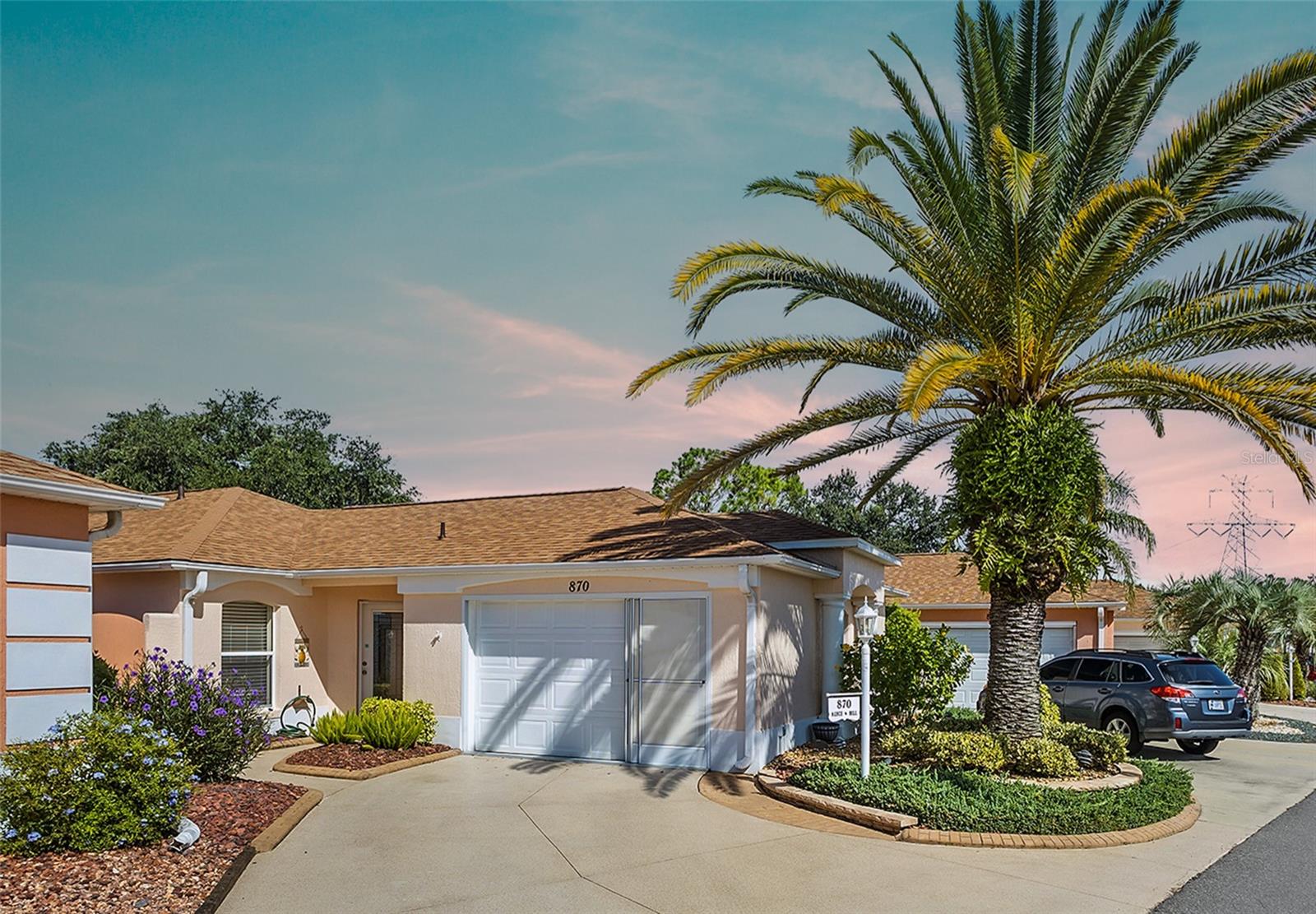 Welcome Home to The Villages lifestyle in this stunning GOLF FRONT 3-bedroom, 2-bath Courtyard Villa in the Village of Palo Alto, perfectly positioned with serene views and located just across the street from the Tierra Del Sol Recreation Center and Theater. Check out the Video by clicking the Video Tour link
Step inside to an open floor plan with soaring vaulted ceilings, creating an airy, light-filled living space ideal for both entertaining and everyday living. The kitchen and bathrooms feature elegant granite countertops, while the primary bathroom has been beautifully updated with a seamless glass door and a tile shower complete with a bench, providing a spa-like retreat at home. Also included is a spacious walk-in closet for maximum storage.
Thoughtful design continues with a built-in desk and cabinetry, offering exceptional storage and functionality. The second bedroom includes a built-in Murphy bed, perfect for guests or a versatile office space. Every detail has been considered to maximize comfort, convenience, and style.
Step outside and take in the golf-front views, ideal for morning coffee or relaxing evenings. Enjoy the unparalleled convenience of nearby recreation, theater, and all the amenities that make The Villages a sought-after community: golf, pickleball, tennis, bocce, and more are just steps away.
This home seamlessly blends modern updates, thoughtful design, and prime location, offering not just a residence but a complete lifestyle. Don’t miss the opportunity to make this Palo Alto Courtyard Villa your own. ROOF 2024, NO BOND.