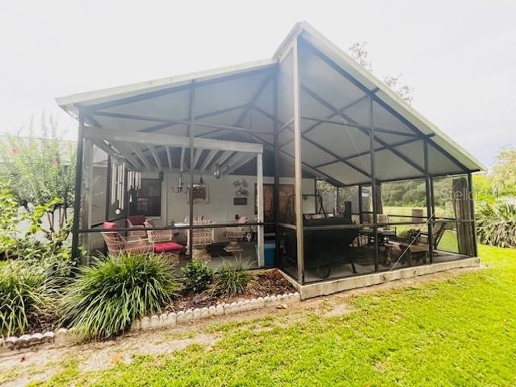 Photo of 38648 Ferm Circle, Zephyrhills, FL 33540 (MLS # TB8411852)