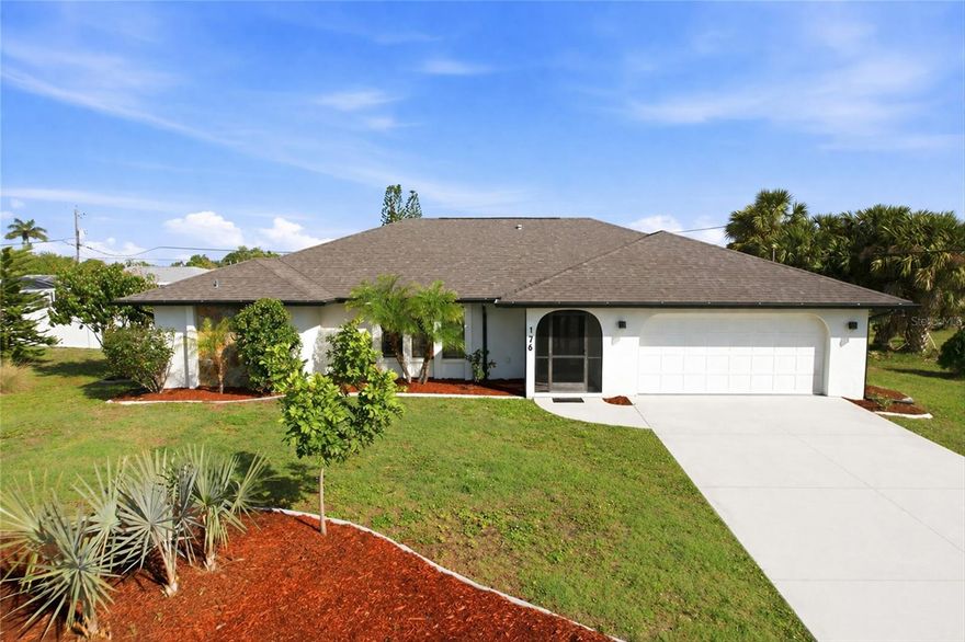 Welcome to this inviting 3-bedroom, 2.5-bathroom pool home with a 2-car garage, perfectly situated on an oversized corner lot in Port Charlotte. Offering 2,164 square feet of living space, this well-maintained residence features classic Florida curb appeal with a wide driveway, arched entryway, and mature landscaping. The expansive lot offers ample room for all your toys, including an RV or boat, along with extra parking, outdoor entertaining space, or even a lush garden to enjoy Florida living at its best.  Inside, the home features an open, split-bedroom floor plan complemented by soaring ceilings, faux wood tile flooring, and contemporary fixtures throughout. The spacious living and dining areas flow effortlessly together, with sliding glass doors from the dining space opening directly to the pool—ideal for indoor-outdoor entertaining. The gourmet kitchen serves as the heart of the home and opens seamlessly to the family room, creating a bright, connected gathering space. It showcases crisp shaker-style cabinetry, sleek quartz countertops, recessed lighting, and a full suite of brand-new stainless-steel appliances. A stunning oversized peninsula anchors the kitchen, offering abundant prep space, a built-in cooktop with modern vent hood, stylish pendant lighting, and generous seating for casual dining or entertaining. A convenient half bath is tucked just off the family room, and nearby access leads directly to the lanai and pool area for effortless Florida living. The primary suite is a true private retreat, offering direct access to the lanai, a spacious walk-in closet, and a spa-inspired en suite bathroom complete with dual sinks and a luxurious Roman shower. Two additional bedrooms with walk-in closets are complemented by beautifully remodeled bathrooms (2022), providing comfortable and stylish accommodations for family and guests. Outside, your private backyard oasis awaits. The screened-in, heated pool is surrounded by an expansive brick paver deck, creating the perfect setting to relax and enjoy the Florida sunshine year-round. A large, covered lanai features ceiling fans for added comfort and a convenient wet bar, making it an ideal space for entertaining, dining al fresco, or simply unwinding poolside.  The home also includes a convenient laundry room located just off the kitchen, complete with a utility closet, washer and dryer, and direct access to the garage. Additional peace of mind comes with hurricane panels and a new roof installed in 2022, offering durability and added storm protection. Ideally located in a quiet and established Northwest Port Charlotte neighborhood, this home offers the perfect balance of peace and convenience. Just minutes from shopping, dining, schools, and everyday essentials—including Port Charlotte Town Center Mall and popular local restaurants—you’ll also enjoy easy access to US-41 and I-75 for seamless travel throughout Southwest Florida. Outdoor enthusiasts will appreciate nearby parks, waterways, and boating opportunities on Charlotte Harbor, while the area’s beautiful Gulf beaches, including Englewood and Manasota Key, are only a short drive away—making it easy to enjoy sun, sand, and coastal living year-round. **PLEASE ENJOY THE 3D INTERACTIVE VIRTUAL TOUR ASSOCIATED WITH THIS LISTING**