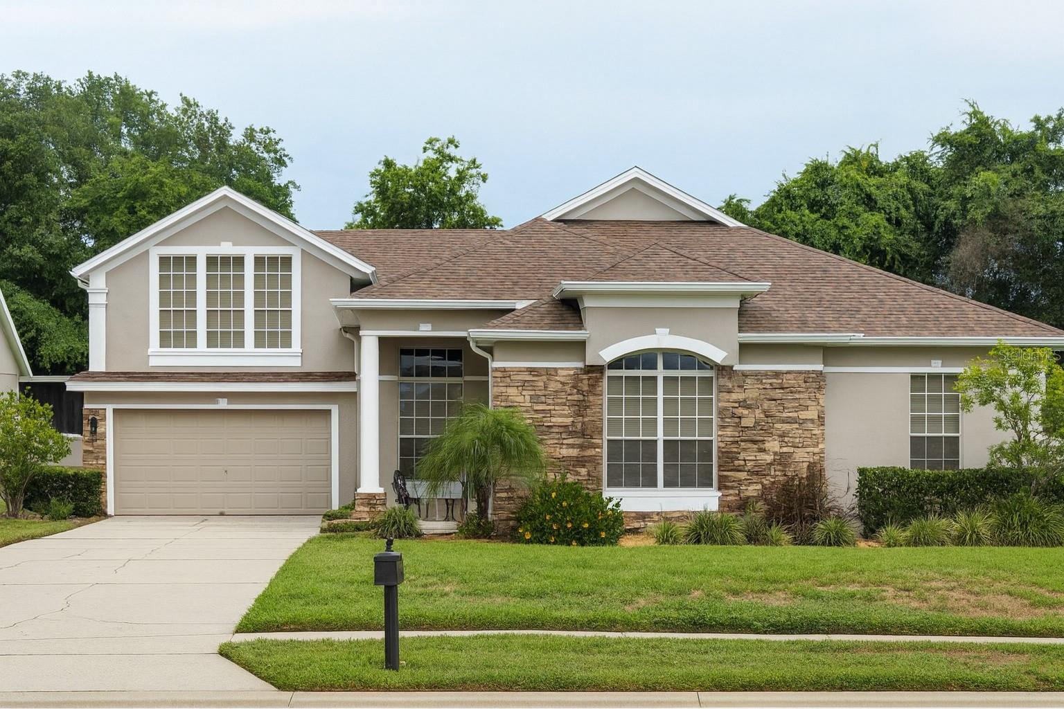 Welcome to your dream home in the highly sought-after Johns Landing community! This immaculate 4-bedroom, 3-bathroom residence offers a perfect blend of elegance, comfort, and convenience—nestled in the heart of charming Oakland, FL. From the moment you step inside, you’ll be greeted by soaring ceilings, abundant natural light, and an open-concept layout ideal for both entertaining and everyday living. This home has been meticulously maintained-- with fresh exterior paint, 2 nest thermostats, engineered hardwood flooring, electric water heater 2024, upgrades to bathrooms, new roof in 2021 and more!
The chef’s kitchen boasts granite countertops, stainless steel appliances, and a spacious island, seamlessly flowing into the family room and dining area. The private owner’s suite features a spa-like bathroom with dual vanities, a soaking tub, and a walk-in shower. Step outside to your covered lanai and enjoy peaceful views of your beautifully landscaped yard—perfect for morning coffee or evening gatherings.
Beyond the comfort of home, you’ll love the location! Just minutes from Walt Disney World Resort, Universal Orlando Resort, SeaWorld, and Orlando’s world-class dining, shopping, and entertainment and the famous Downtown Winter Garden area. Outdoor enthusiasts will appreciate easy access to the West Orange Trail for biking and walking, as well as nearby Lake Apopka for boating and fishing. With close proximity to major highways, commuting to Downtown Orlando or Orlando International Airport is a breeze. The neighborhood features 2 pickleball courts, tennis court and playground as we well as community boat ramp to John's Lake.
Don’t miss this rare opportunity to own a slice of Florida paradise—schedule your private tour today!