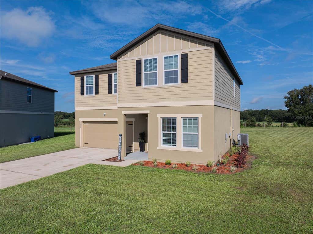 Photo of 15623 Merlin Avenue, Mascotte, FL 34753 (MLS # O6435955)