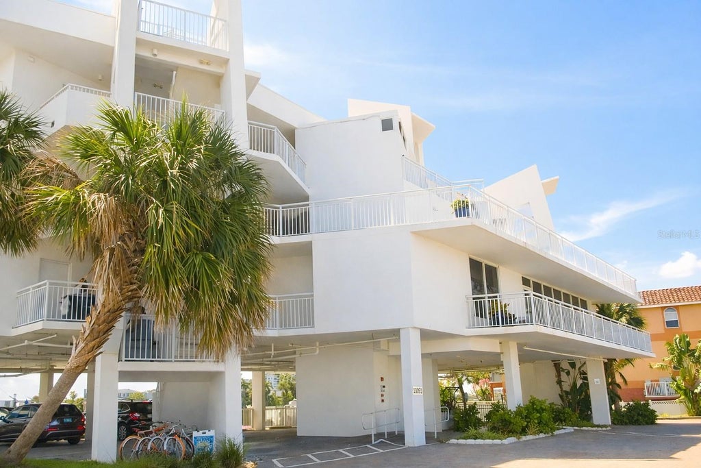 Photo of 10091 Gulf Boulevard #203E, St Petersburg, FL 33706 (MLS # TB8526114)