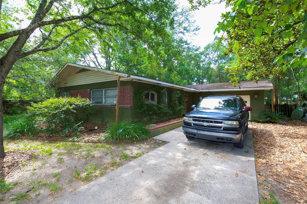 Photo of 609 NW 14th Avenue, Gainesville, FL 32601 (MLS # V4950140)
