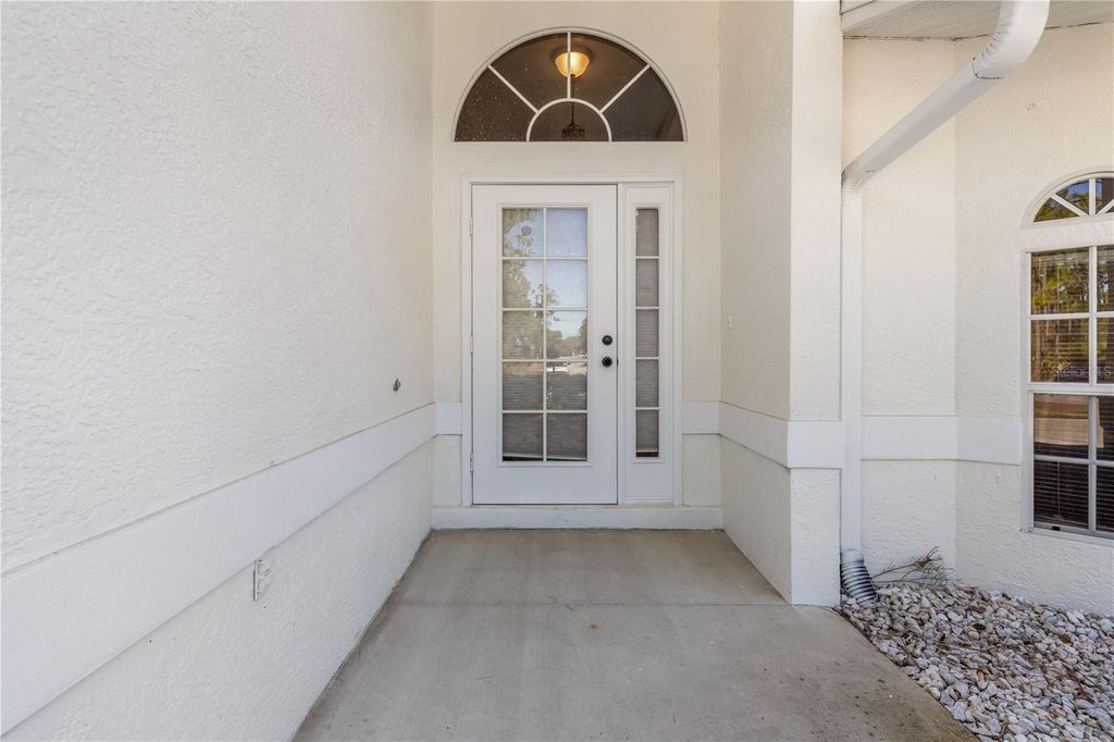 Photo of 23385 Hemenway Avenue, Port Charlotte, FL 33980 (MLS # C7522016)