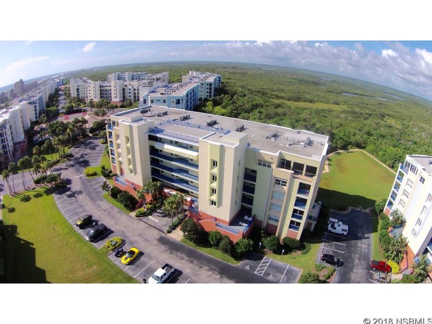 One of if not the nicest end units offered in the well known resort and ocean side community of Ocean Walk. This large end unit offers tall ceilings, 3 large bedrooms, a large upgraded kitchen with custom granite counters, all wood hand crafted cabinets, top of the line stainless appliances as well as tile floors throughout including the ceramic tile that looks like real wood. This floor plan is one of the most popular (and only offered in 3 buildings at Ocean Walk) for its unique layout. Offering views of both the ocean and preserve, sit and watch amazing sunrises from your private front screen enclosed balcony and sunsets from the second private screen enclosed rear balcony. The best of both worlds offered here. Located perfectly, near the large pool area and amenities as well as the main north gate entrance. The master offers a large walk-in closet and an additional closet for even more space. There is a jetted tub in the master along with custom vanities and granite counters.No thought was left out on this upgraded recently remodeled end unit home in the sky. Other noted features are an ac unit 4 years new, full size wash sink and vanity in the laundry room along with full size washer and dryer. This is one of only a handful that offers soundproof interior walls throughout to ensure total quiet. Storm shutters are on the entire unit, windows are electronically controlled with the touch of the switch and both balconies offer total protection with full sliding storm shutters. Only the end units come with the extra large storage rooms on each floor. We offer a true 3D video of the unit upon request. Ocean Walk offers 24 hour gated community with 2 large pools, tennis courts, basketball courts, indoor theater room, under building parking with elevators from the garage directly to your floor, miles and miles of nature and walking trails, access to the river. Located on the no drive beach section. All information is intended to be accurate but not guaranteed. ;LocationDescription: Condo ;Water: City