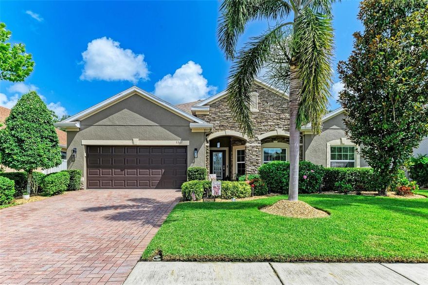 BIG $50,000 PRICE DROP!!  NOW LISTED WELL BELOW RECENT COMPARABLE SALES.  Welcome to your dream home in the highly sought-after gated community of Oakleaf Hammock! This beautifully upgraded Bonita floorplan offers 3 spacious bedrooms, 2.5 bathrooms, a dedicated home office, and a 3-car tandem garage—all nestled on a private preserve lot with no rear neighbors. From the moment you arrive, you’ll be impressed by the stone-accented exterior, paver driveway, manicured landscaping, and custom glass front door. Step inside to find a light-filled open layout with tile flooring throughout the main living area, elegant tray ceilings in the great room and master suite, and upgraded finishes throughout. The heart of the home is the kitchen featuring quartz countertops, cabinets with crown molding, tile backsplash, pendant lighting, and stainless steel appliances. The kitchen opens seamlessly to the great room and eat-in dining area, perfect for entertaining. Retreat to the spacious master suite offering vinyl plank flooring, a tray ceiling, large walk-in closet, and a en-suite complete with dual sinks, quartz countertops, a garden tub, and a walk-in tiled shower. Two sets of sliding glass doors lead to your private outdoor oasis, where you’ll enjoy a refreshing pool, plenty of room for lounging or entertaining, and tranquil views of the preserve. The chlorine pool has a solar heater and comes with a child safety fence. The tandem 3 car garage has an extended length of approximately 36 ft on one side. The garage has been upgraded with a Polyaspartic decorative chip flooring system as well as 2 overhead storage racks. The owners upgraded the front door as well as both slider doors with a high strength tinted film. The home also comes with a security & camera system, gutters, an irrigation system, hurricane shutters. The exterior of the home was painted in 2023. Oakleaf Hammock residents enjoy access to community amenities including a playground, picnic pavilion, and basketball court. The neighborhood is conveniently located near shopping, dining, I-75 and I-275, offering easy commutes to both Sarasota and Tampa. Plus, you’re just a short drive from Florida’s breathtaking Gulf Coast beaches. This home truly has it all—style, comfort, location, and upgrades throughout. Don’t miss your opportunity to make it yours!