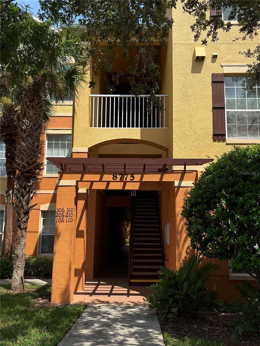 Photo of 8775 Sartori Street #309, Orlando, FL 32829 (MLS # O6429033)