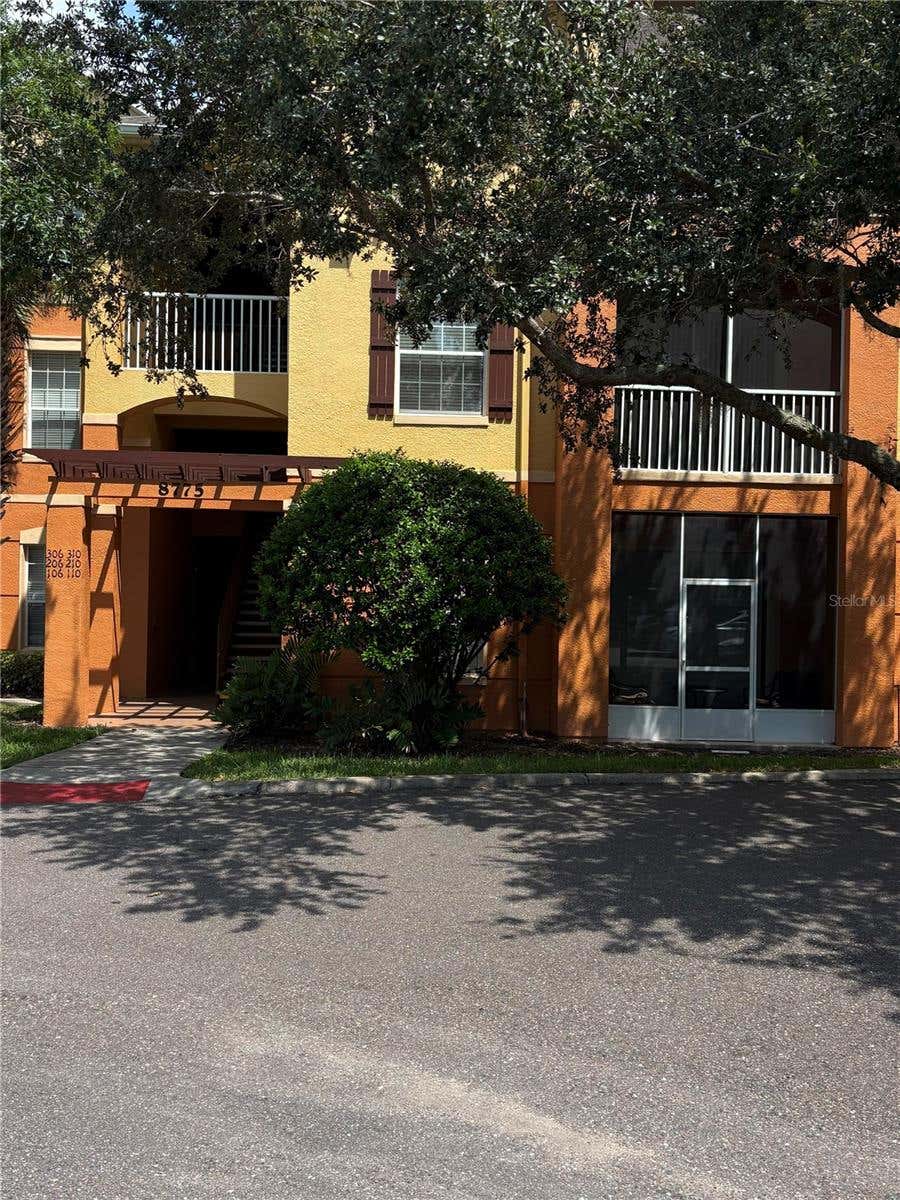Photo of 8775 Sartori Street #309, Orlando, FL 32829 (MLS # O6429033)