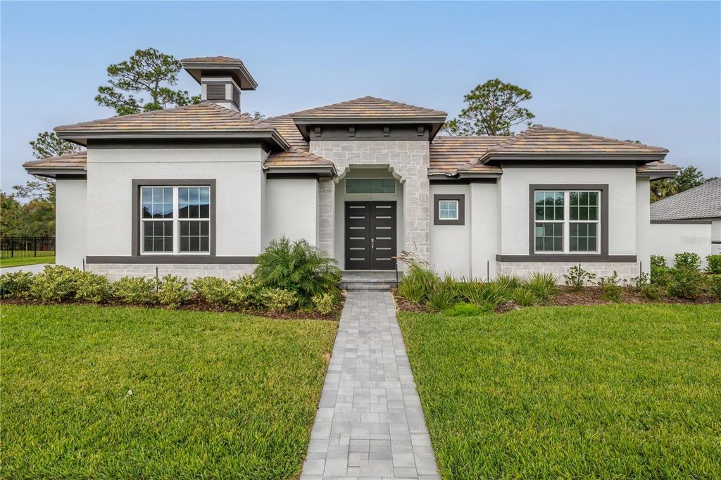 Photo of 109 New Leatherwood Drive, Palm Coast, FL 32137 (MLS # FC314738)