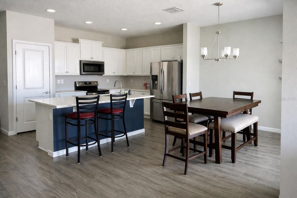 Photo of 372 Meadow Pointe Drive, Haines City, FL 33844 (MLS # O6378587)