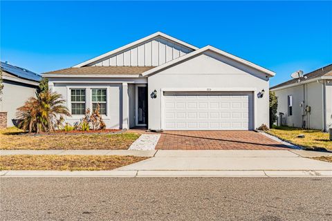 Photo of 372 Meadow Pointe Drive, Haines City, FL 33844 (MLS # O6378587)