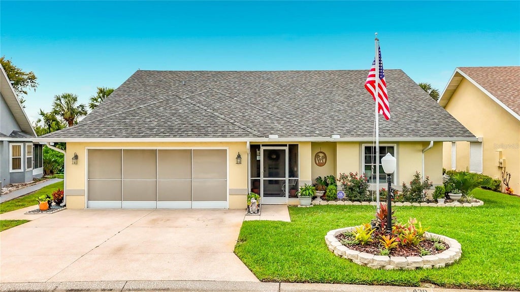 Photo of 430 Harbourview Drive, Haines City, FL 33844 (MLS # O6445124)