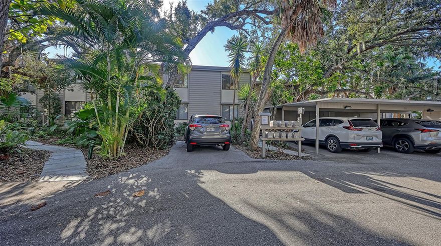 Under contract-accepting backup offers. Security, Serenity, and Front-Row Waterfront Views

Step into a lifestyle of peace and privacy in Pelican Cove, an award-winning, 24-hour guard-gated community set across 75 acres of lush, botanical-like grounds. This 3-bedroom, 2-bathroom condo offers a rare "front-row seat" to the canal leading directly to the Intracoastal Waterway. While you aren't tucked away in the harbor, you have the best view in the house: watching the daily parade of boats navigate to and from the community’s 87-slip private marina.

Nature lovers will be just as captivated by the active birdlife and tropical scenery right outside the door. This residence is well-priced, offering the perfect opportunity for the next owner to renovate and create a personalized masterpiece in a premier location. Practicality is covered too, with a private carport and a dedicated storage room.  
A Community Like No Other Pelican Cove is famous for its social energy. From "Pelican Cove University" seminars and live seasonal music to woodworking, art clubs, and over 30 social organizations, there is always a way to connect. Stay active with:
6 heated swimming pools,

Miles of scenic trails and boardwalks,

Tennis and pickleball courts,

A dog park, kayak launch, and fishing pier!

Prime Sarasota Location You are minutes away from the excitement of the Sarasota Square redevelopment, which is bringing Whole Foods, HomeSense, and Trader Joe's right to your doorstep. When you’re ready for the beach, the South Bridge to the world-famous white sands of Siesta Key is just a short drive away.