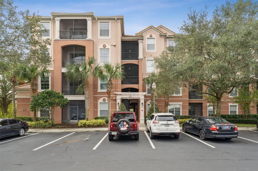 One or more photo(s) has been virtually staged. Welcome to resort-style living in the highly sought-after, gated community of Bella Trae! This top-floor condo offers privacy, convenience, and a fantastic investment opportunity with a long-term tenant already in place—perfect for investors looking for immediate rental income.

Enjoy peaceful mornings and relaxing evenings from your enclosed patio with a beautiful view! Inside, the thoughtfully designed floorplan features dual primary bedrooms, ideal for flexibility and comfort, along with a third bedroom that can easily function as a home office, guest room, or flex space.

The main living area offers a seamless flow with a combined living and dining space, all overlooked by the kitchen—perfect for both everyday living and entertaining. Recent upgrades include fresh interior paint and a full suite of newer appliances (2025), including the dishwasher, range, and refrigerator. Ceiling fans in the bedrooms provide added comfort, and a full-sized washer and dryer are conveniently located within the unit.

The building features two elevators for easy access, plus the added benefits of a covered carport and a private storage area. HOA dues include basic cable and internet, water, pest control, and exterior maintenance—making for truly low-maintenance living.

Residents of Bella Trae enjoy access to a stunning clubhouse with resort-style amenities, including a zero-entry pool, state-of-the-art fitness center, fitness studio, media room, billiards room, bocce ball court, putting green, and a full calendar of social activities.

Ideally located near multiple golf courses and major highways, this property offers both tranquility and convenience. Whether you're expanding your investment portfolio or planning for future personal use, this is an opportunity you won’t want to miss!