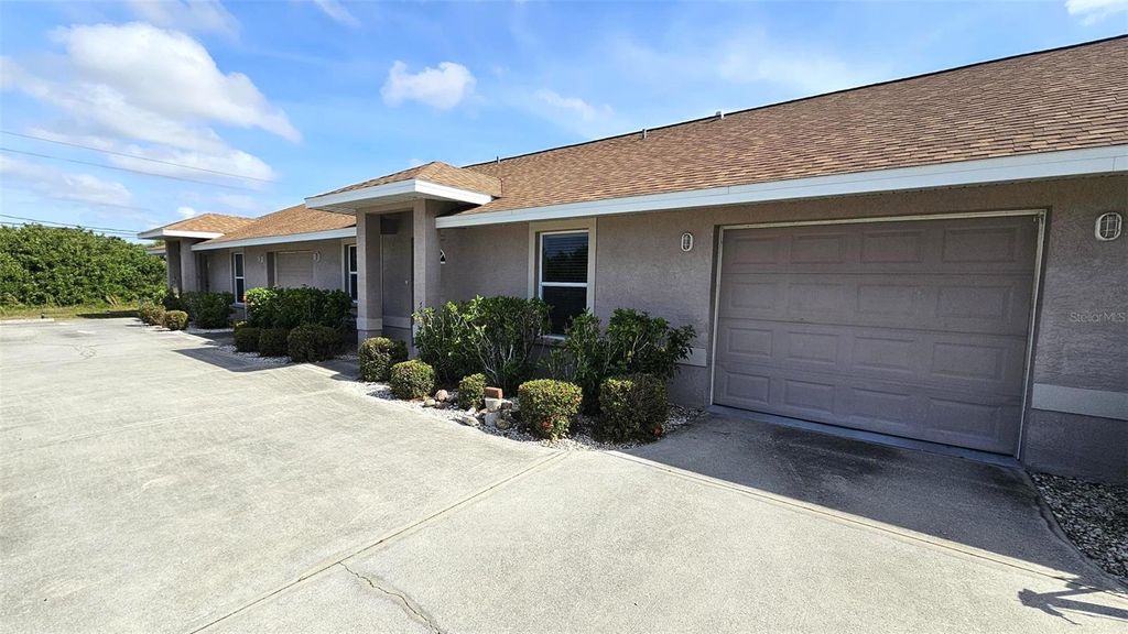 Photo of 309 Boundary Boulevard #B, Rotonda West, FL 33947 (MLS # S5147509)