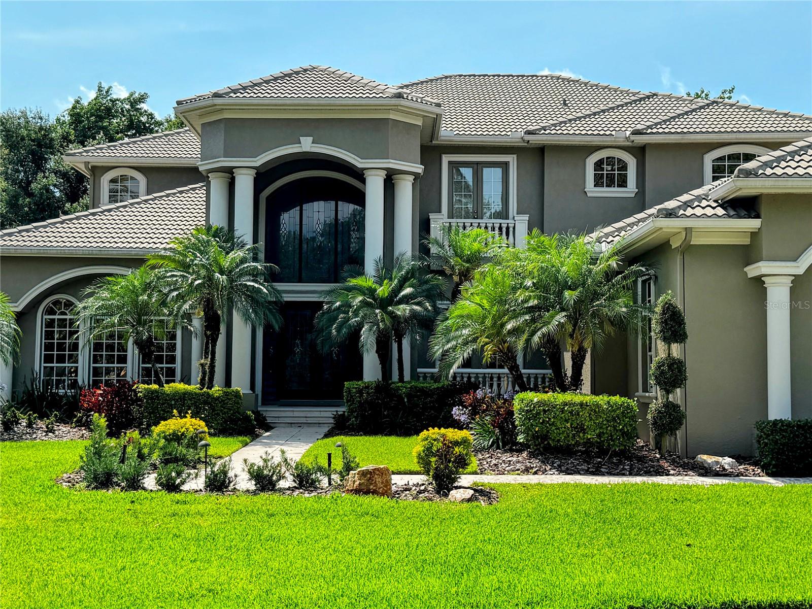 PRICE IMPROVEMENT --QUIET CONSERVATION, GATED COMMUNITY, NO REAR NEIGHBORS, LARGE LOT, CUL DE SAC, CONVENIENT LOCATION, NO CDD.
Discover the perfect blend of privacy and sophistication in this fully renovated Tampa Palms estate, nestled on .41 acres of serene landscape. Designed for both work and leisure, this stunning home features two first-floor offices (The Homeowner is using the home gym as the second office, this includes a wall of mirrors), which can also be used as a nursery, or extend the Master Closet to make your own customized dream closet. The owners added a 437 sqft game room to create the ultimate entertaining experience alongside the existing upgraded 8-person custom theater.
Luxury Meets Functionality
Step inside to soaring first-floor ceilings and a family room equipped with an 85-inch 8K QLED TV and surround sound—ideal for movie nights or hosting guests. The primary bedroom is conveniently located on the first floor for ease and comfort.
Prime Location & Exclusive Amenities
Located in an upscale gated community, this estate offers unparalleled convenience—minutes from Tampa Premium Outlet, International Mall, restaurants, Tampa Airport, and major highways (I-275, I-75, and I-4).
Chef’s Dream Kitchen
The brand-new kitchen is a masterpiece, featuring high-end GE Monogram appliances, custom cabinets, and specialized features like a trash compactor, ice maker, and a 44-cubic-foot refrigeration system. The buffet bar includes four individual beverage centers, making entertaining effortless.
Equipped with a full-size freezer, full-size refrigerator, dual wine reserves, and a 48" professional Monogram gas range with griddle, this kitchen is designed for culinary excellence.
Unparalleled Comfort & Entertainment
- 400 sqft game room with an optional eight-foot professional pool table
- Master suite with a custom Kohler 13kW steam shower and digital controls
- Engineered hardwood floors & high-end carpeting throughout
- Revamped garage with enhanced storage and organization
- WEDI-renovated bathrooms for superior durability
- New marine-grade outdoor kitchen with a HESTAN grill for outdoor dining
- Work seamlessly from home with 7GB Fiber Internet.
A Private Estate in the Heart of Tampa
Situated in a peaceful cul-de-sac, surrounded by conservation land, this estate offers tranquility with endless customization opportunities. Whether you're relaxing or entertaining, every detail is designed for modern luxury.
Club Tampa Palms has restricted access to Tampa Palms North homeowners, offering a fitness center, tennis courts, changing rooms with lockers, sauna, and a large community pool.
The home's proximity to Downtown Tampa and top-tier amenities makes it an absolute must-see.
Your dream home awaits—schedule a showing today!