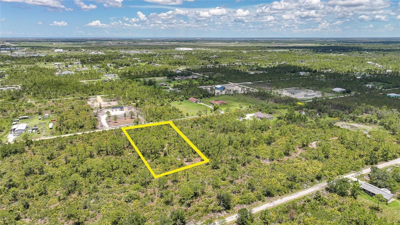 Discover the potential of a spacious 1.25-acre vacant lot located in the rural Charlotte Ranchettes community of Punta Gorda, Florida. Zoned Agricultural (AG), this property offers the flexibility to build a custom home, establish a hobby farm, or keep horses and livestock—all without HOA restrictions. The land is mostly cleared with scattered mature trees, providing a blend of open space and natural shade. Electricity is available nearby, making the lot ready for development. A well and septic system will be required, as there are no public water or sewer connections in the area. The property sits in FEMA Flood Zone X, indicating minimal flood risk, and has direct access via an unpaved private-maintained road. Surrounded by a quiet, semi-rural setting, yet just a short drive to downtown Punta Gorda, I-75, and Punta Gorda Airport, this lot combines privacy with convenience. Whether you're looking to build your dream home, store recreational vehicles, or invest in land with long-term potential, 8346 Acorn Blvd presents a rare opportunity to enjoy Florida living on your terms.