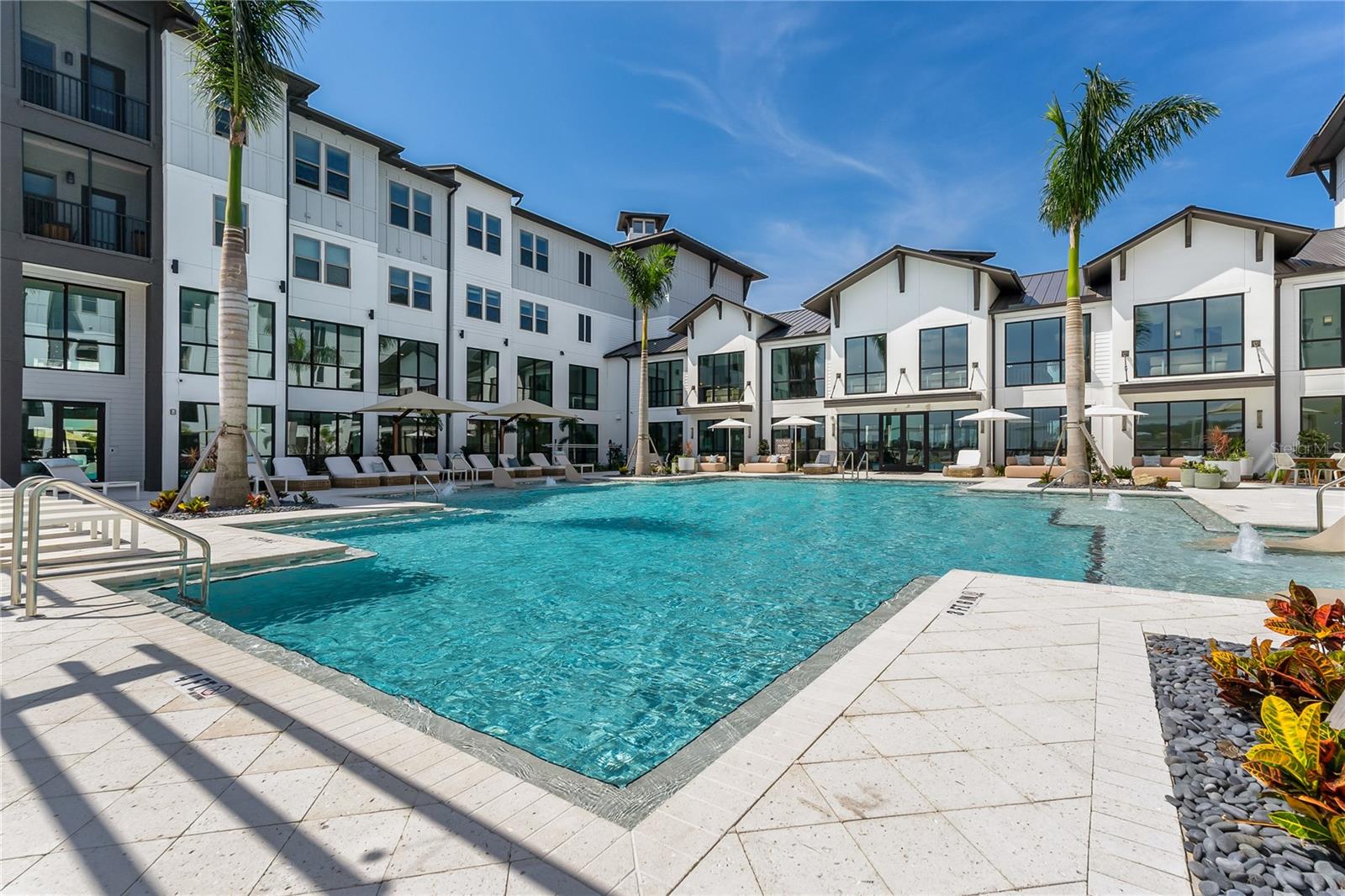 The Row Waterside in Lakewood Ranch is a BRAND-NEW rental community located in Sarasota County. These spacious studio, one, two and three bedroom apartments and two and three bedroom townhouses, are full of the modern conveniences and amenities that you would want in your rental. Every unit in this community offers beautifully done finishes with open concept layouts, contemporary lighting fixtures, custom cabinetry, gourmet kitchens with executive chef undermount sinks, energy efficient and stainless appliances and full-sized washer and dryers. The townhouses have their own attached 2-car garages. These are just a few of the many features you will have in your apartment or townhouse. The Row Waterside also allows up to two pets per apartment. You will have full access to all the amenities this community has to offer, a resort-inspired swimming pool, full-size grilling options with lounging areas by the pool, poolside gaming area with cornhole, state-of-the-art fitness center, movie theater, cyber café, pet spa, gourmet coffee bar, private conference rooms, the amenities list is endless at The Row. Located within walking distance of Main Street in Waterside, you will find endless shopping, restaurants, and entertainment. (Minimum 7-month leases are available (Pricing varies on shorter terms). Up to 6 WEEKS FREE on select units AND $99 "Look and Lease" with reduced admin and application fee at move in!!!