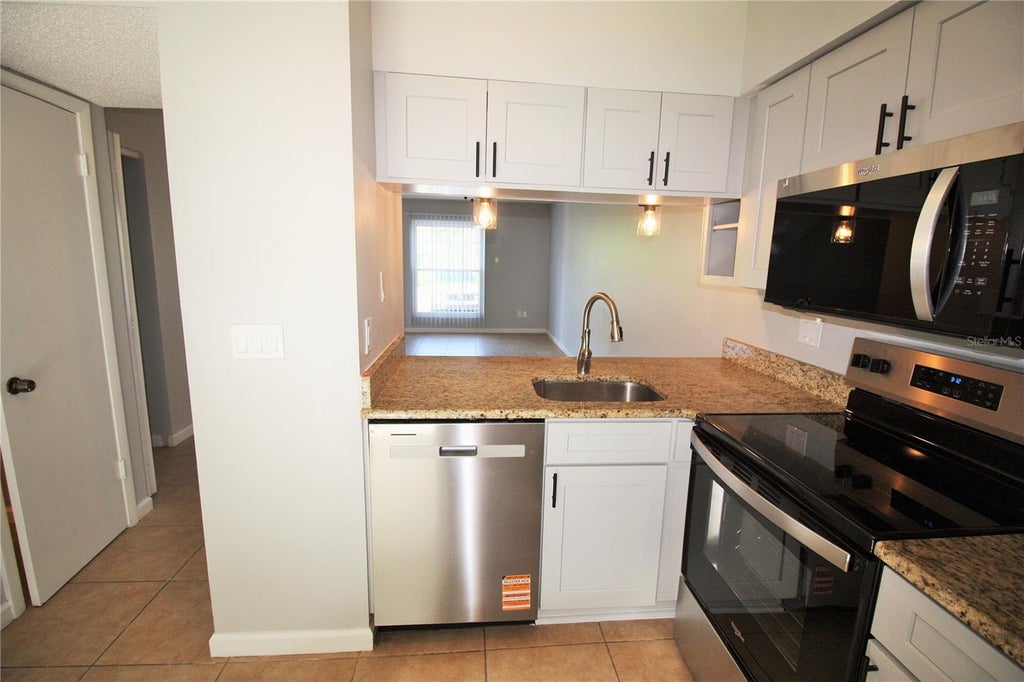 Photo of 2520 Lancien Court #2522, Orlando, FL 32826 (MLS # R4912031)
