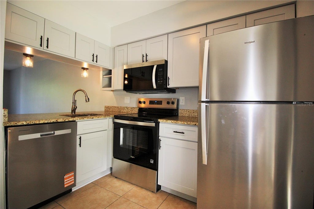 Photo of 2520 Lancien Court #2522, Orlando, FL 32826 (MLS # R4912031)