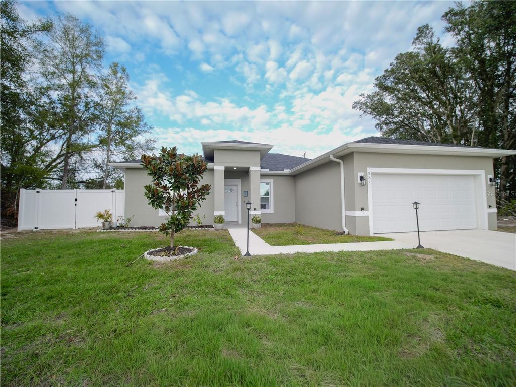 Photo of 237 Marion Oaks Trail, Ocala, FL 34473 (MLS # O6385446)