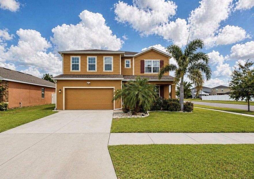 Welcome to this spacious & beautifully upgraded home located on a premium corner lot with an oversized back yard in the highly sought-after Carlton Lakes community of Riverview! Offering 5 bedrooms, 2.5 bathrooms, and over 2,800 square feet, this 3-car garage home blends functionality, flexibility, and outdoor living at its finest. Meticulously cared for, the sellers have done a pre-listing inspection and have a clear Four Point inspection report for the buyer's peace of mind and insurance on this stunning property. Step inside to soaring 9-foot ceilings, 8-foot doors, and a thoughtfully designed floor plan featuring a dedicated office/den (currently configured as a 4-bedroom + office), formal dining space, and an open-concept living area perfect for entertaining. The kitchen is enhanced with a custom dry bar, providing additional storage and a stylish touch for hosting. Upstairs, you'll find an oversized loft offering endless possibilities: create a second living room, home theater, gym, or game room to fit your lifestyle. The spacious primary suite and additional bedrooms provide comfort and versatility for any living situation. The laundry room is conveniently located upstairs with the bedrooms. Enjoy Florida living outdoors with an extended screened-in lanai and an additional concrete patio: ideal for grilling, entertaining, or creating your own firepit or game area. The oversized fenced backyard offers privacy, a peaceful water view, and plenty of room to design your dream pool oasis or enjoy wide-open space for play and relaxation. Additional features include a 3-car tandem garage with added storage space and a generous lot size of over a quarter acre! Bonus: VA assumable loan at an incredible 2.25% interest rate (for qualified VA buyers), offering a rare financing opportunity in today's market. Located near the community clubhouse & pool, top-rated schools, shopping, dining, and major highways, this home truly offers the complete package of space, upgrades, and location. Schedule your private showing today and experience everything this exceptional home has to offer!
