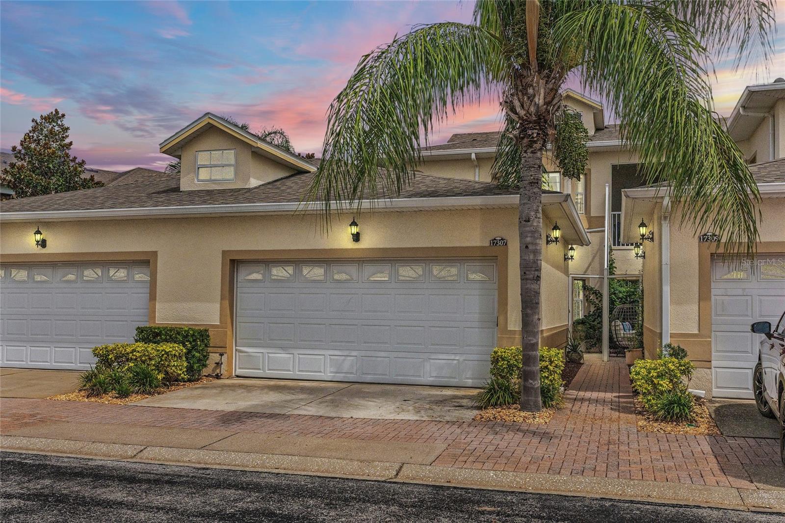 Beautifully refreshed home in the 24/7 guard-gated, lakefront community of Magnolia Pointe! This move-in-ready property features fresh paint, new luxury vinyl plank floors, and renovated bathrooms. Enjoy resort-style living with a community pool, private beach on John’s Lake, fishing pier, scenic boardwalk, boat dock with parking, and courts for tennis, pickleball, and basketball. Perfectly located just off Hwy 50, only 7 minutes to the Turnpike, and right across from the new Costco, this home offers the perfect blend of comfort, convenience, and lakefront lifestyle.