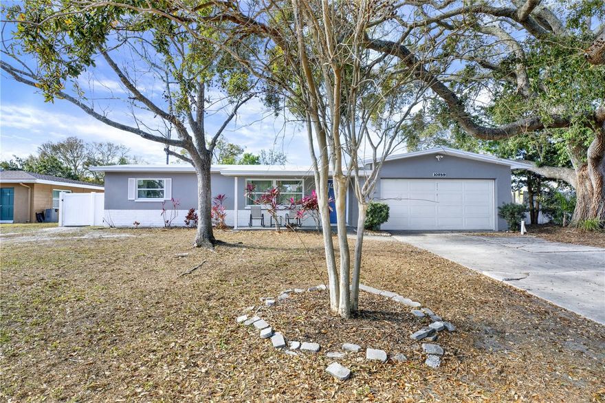 Located on a quiet cul-de-sac in one of Seminole’s most treasured neighborhoods, this move-in-ready pool home offers upgrades, space, and an ideal location for easy family living.

The concrete block home features 3 bedrooms, 2 baths, and a 2-car garage. Inside, 1,490 sq ft of well-planned living space is arranged in a split floor plan that balances connection and privacy.
Light-filled living areas showcase luxury vinyl flooring, a remodeled kitchen with stone countertops, and stylishly updated bathrooms. The primary suite is privately positioned away from the secondary bedrooms and includes a renovated en-suite bath.

Major improvements are already complete — BRAND NEW Impact windows and sliders (2/26), Roof (11/25), Electrical Panel (10/18), and Water Heater (10/18) — adding long-term value and helping reduce insurance costs.

The backyard pool sets the stage for weekend barbecues, birthday parties, and relaxed Florida living. Just minutes to the Pinellas Trail and Blossom Lake Park. Within walking distance to Orange Grove Elementary and Keswick Christian School. Approximately 10 minutes to the Gulf beaches and only 20 minutes to vibrant Downtown St. Pete.

Located in Flood Zone X — no flood insurance required.