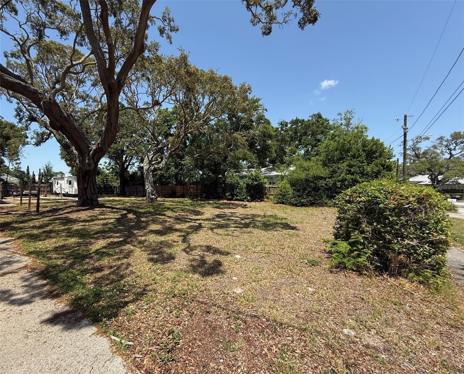 Don't pass up this rare opportunity to own one of the few available lots in desirable Pinellas County, offering unbeatable flexibility and location. Zoned for Medium Density Residential use- you can build a duplex or Single Family Home (SFH) with Accessory Dwelling Unit (ADU) or mother-in-law suite, etc (up to 2 units) making it perfect for a wide range of residential or investment possibilities. 2 successful and beautifully maintained Airbnbs are nearby. Located just minutes from Morton Plant Hospital, a short drive to top-rated restaurants, shopping, and less than 10 minutes (without traffic) from the sugar sands of Clearwater Beach and Pier 60, also down the street from Ross Norton Recreation Center, Coachman Park, and Belleview Lake. Whether you're envisioning a private residence, income-generating ADU, commercial venture, or considering renting to snowbirds, vacationers, traveling nurses, or house hacking- this lot delivers endless potential in one of Florida’s most sought-after regions.
The lot features: partially fenced on 3 sides to give an idea of the lot lines and a sense of privacy. A quiet, local, non-through street that limits your traffic and noise. No flood zone and non-evac zone offers peace of mind during storm season. Already equipped with a sidewalk and street lights for your safety. No HOA but pride of ownership shows in this neighborhood. Owner will consider seller financing and creative terms.
*Vacant land rarely has an address or lot number posted. (The lot is in between 908 and 916). Lot 10 only included in this sale. There have been occasions when a buyer has closed on a property and determined, after the closing, that the property conveyed to the buyer was not the property the buyer had visually identified prior to signing the contract. It is the buyer’s responsibility to confirm the legal description of the property the buyer wants to purchase prior to the end of the contract Property Inspection Period. The best way to accomplish this is for the buyer to obtain a survey that depicts a physical immovable object on the property or adjacent to the property that irrefutably confirms the property identified in the survey is the property the buyer wants to purchase.