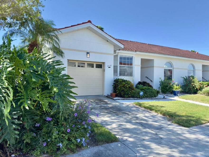 Beautiful spacious 3 Bedroom/2 Bath Villa with a one car garage! Must See interior. This Villa is on El Conquistador PKWY in the Palm Court Community just behind the IMG Academy. United Tennis Academy and the IMG Academy Golf Club with his clubhouse for dining are just minutes away. 
In this mediterranean flair community the villa offers great features like an open floor plan, updated ceiling fans, high vaulted ceilings, light fixtures, new stainless steel appliances and new washer and dryer. The third Bedroom is open, has a closet but can be also used as a den or office. 
HOA fees include Pest Control, Sewer, Trash, Internet/TV, Flood Insurance, Exterior and grounds Maintenance, Maintenance repairs and community Pool (extra quarterly fee to use the pool!!). The tile Barrel Roof will be renewed soon under assessment which will be paid by Seller. Rheem AC is from 2019, 2nd AC unit for the Master Bedroom and Master Bath was rebuild 2024, Water Heater is from 2018. Fenced backyard offers a great space for BBQ's and/or plenty of room for your pets. 
The beautiful Beaches of Anna Maria Island are just 15 driving minutes away and to the Sarasota airport also 15 minutes. 
Call Today for a Showing!!