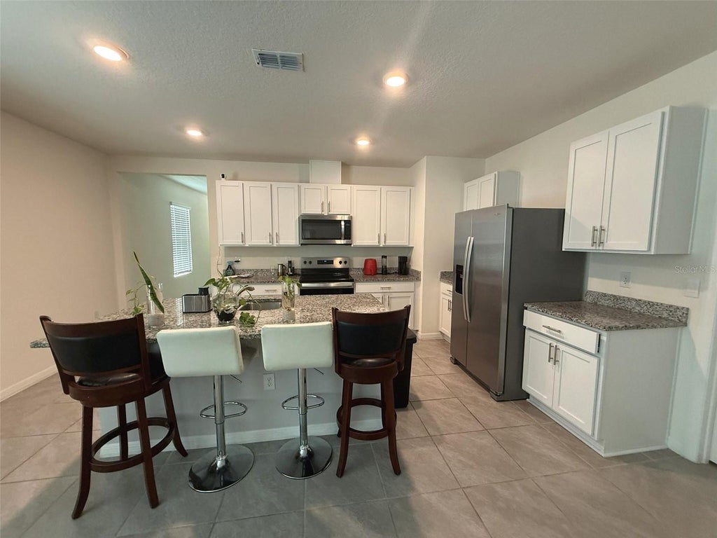 Photo of 1823 Cacutta Way, Kissimmee, FL 34744 (MLS # S5155465)