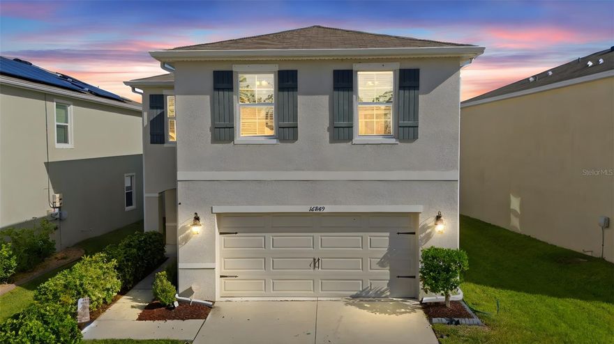 Welcome to this spacious home in the sought-after Southshore Bay, a gated, resort-style Lagoon community! From the moment you step inside, this two-story layout greets you with an open, airy feel. The expansive downstairs space features a seamless flow between the living room, dining area, and kitchen. A convenient powder room and covered patio complete the first floor. The kitchen features a large granite island. You'll love the abundance of cabinets, counter space, and the roomy pantry. The two-car garage opens directly into the kitchen area, with dual hallway closets offering generous storage. On the second floor, the primary bedroom features a luxurious en-suite bath with double vanity, a spacious walk-in closet, and a separate linen closet. Three additional bedrooms share a second full bath with double sinks, and one of the bedrooms offers its own walk-in closet. At the top of the stairs you will find a cozy loft area and reading nook. The washer and dryer are located upstairs, close to the bedrooms. Step outside to your large, fenced backyard—perfect for pets, play, or soaking up the Florida sun. This home gives you access to an incredible list of amenities: A stunning 5-acre Crystal Lagoon with swim-up bar and sandy beaches, recently upgraded UltraFi high-speed internet (among the fastest in the nation!), Resort-style swimming pool, Fitness center, Walking trails, Dog park, 24-hour security at the main entrance. Located minutes from I-75 and US-301, giving you easy access to Tampa, the airport, and the beautiful Gulf Coast beaches.