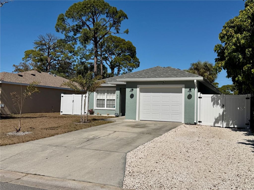 Photo of 917 Winter Garden Drive, Sarasota, FL 34243 (MLS # A4682433)