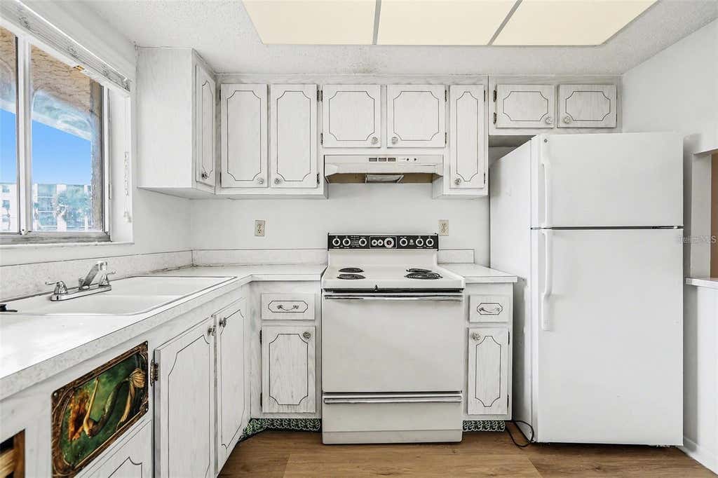 Photo of 3723 Lake Bayshore Drive #H206, Bradenton, FL 34205 (MLS # A4702549)