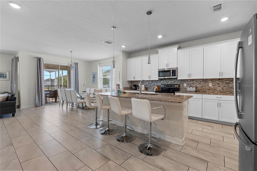 Photo of 1559 Flange Drive, Davenport, FL 33896 (MLS # O6408222)