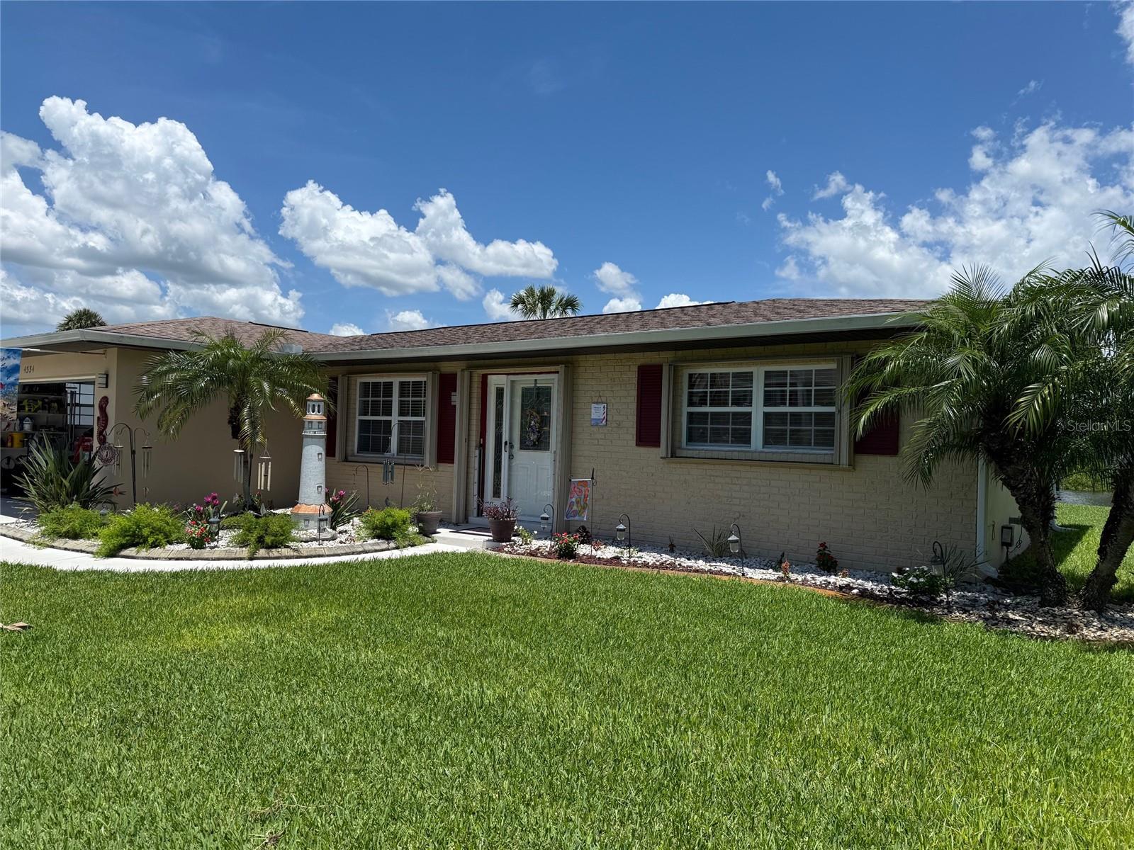Live the Florida lifestyle in this beautifully updated 2-bedroom, 2-bath waterfront pool home offering direct boat access to the Bay with just one bridge—you're only 7 minutes to open water!
Relax or entertain in the heated pool, complete with a valet system, retractable awning for shade, and flood barrier wall securing every entrance. Accordion shutters add peace of mind, while the transfer box for a generator ensures you’re always prepared.
Inside, enjoy the comfort and style of new luxury vinyl plank flooring, quartz countertops, and fresh interior paint (2024). The home also features:
New water heater (2025)
AC & electrical (2019)
Roof (2018)
All appliances (2024)
Two beautifully tiled walk-in showers
Located just minutes from Port Charlotte’s best restaurants, shopping, parks, and of course, endless boating adventures, this home combines coastal charm with unbeatable convenience.
Your waterfront dream home awaits—schedule your private showing today!